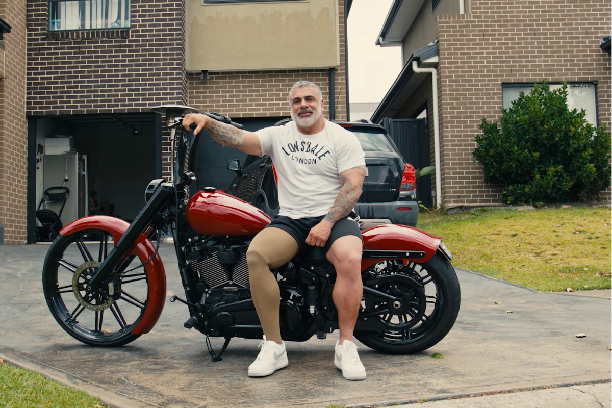Fabian sitting on his motorbike in his driveway